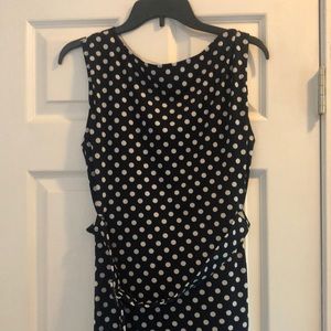 Mid length navy blue and white polka dot dress
